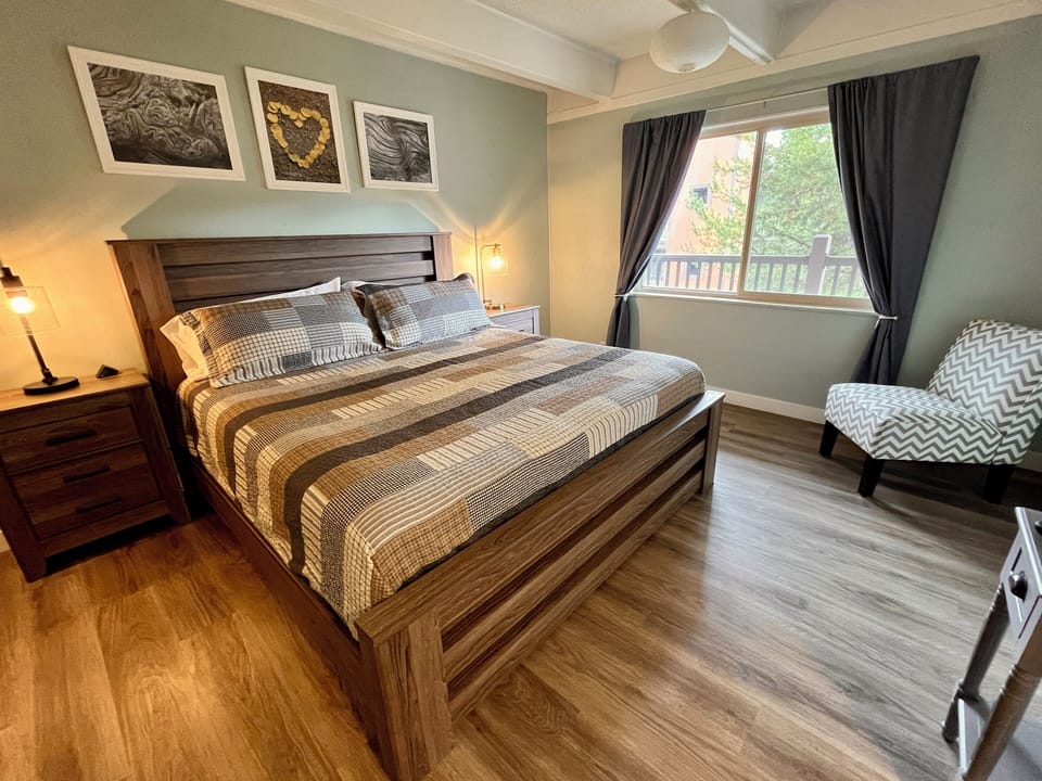 The primary includes a king-size bed, private en suite bathroom, and cable tv.