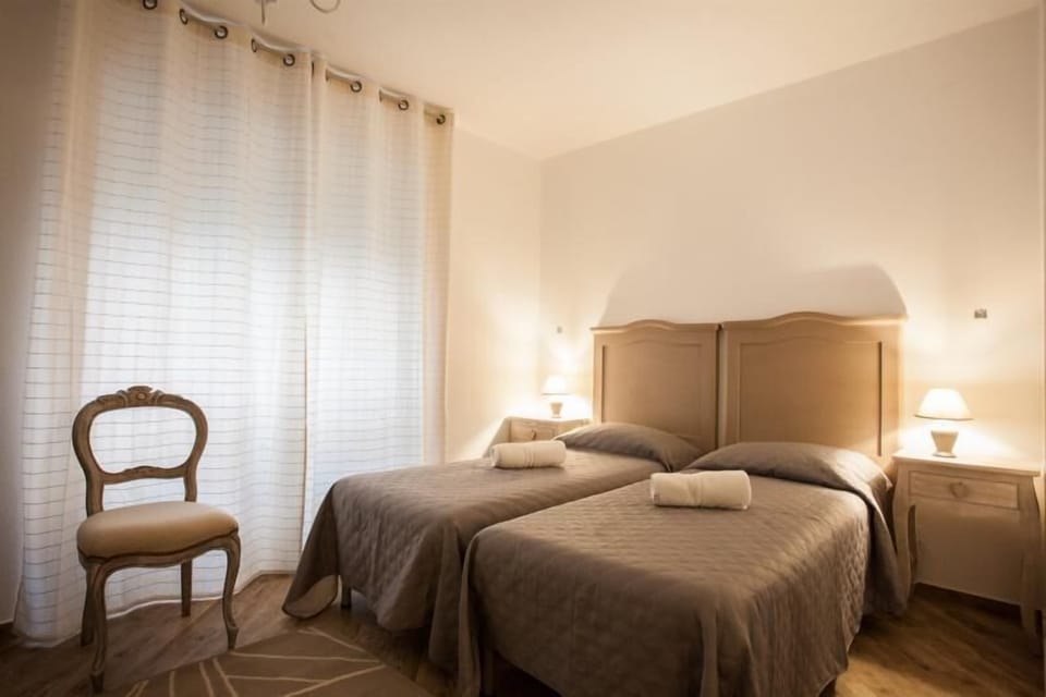 Standard Twin Room | Desk, blackout drapes, iron/ironing board, free WiFi