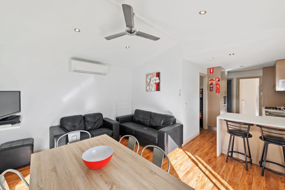 Parkview Cabin | Living area | Flat-screen TV, table tennis, books, video library