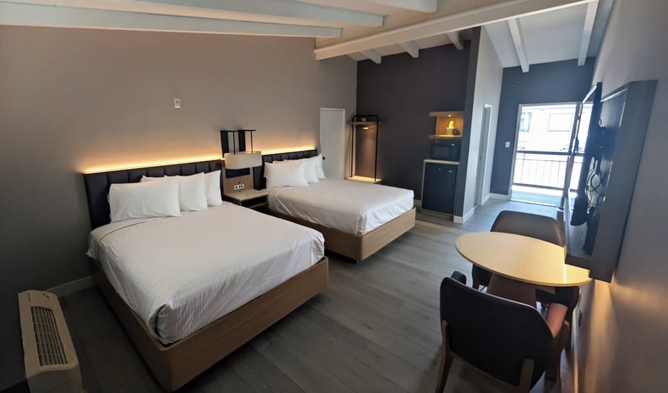 Double Queen Non-Smoking | Desk, iron/ironing board (on request), WiFi (free), bed sheets