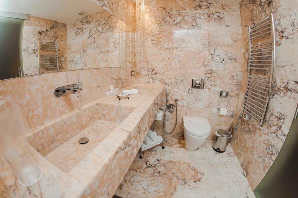 Shower, free toiletries, hair dryer, bathrobes