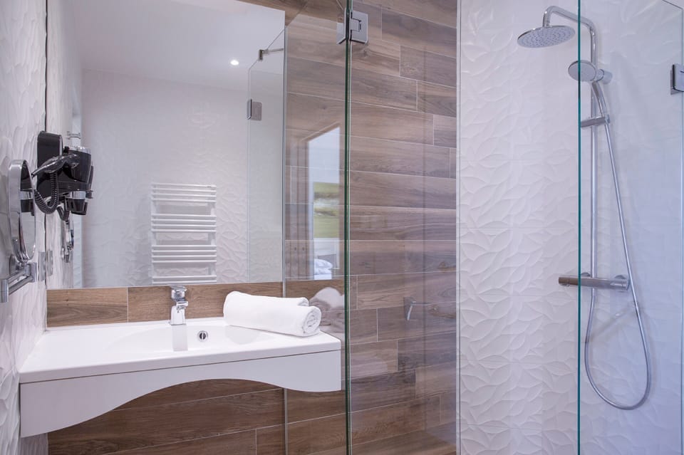 Hair dryer, towels, soap, shampoo