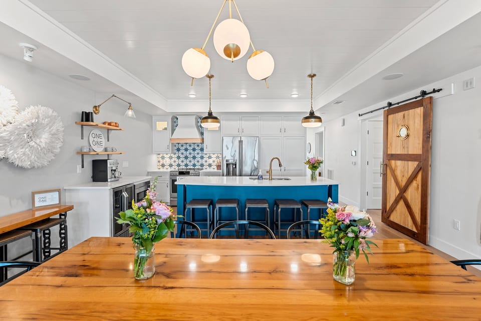 Fully equipped kitchen includes coffee station and counter top seating.  