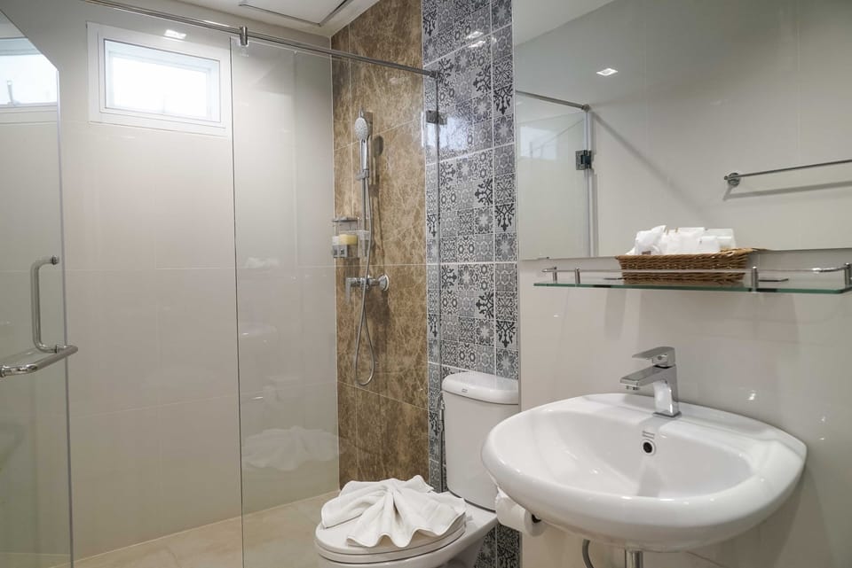 Shower, free toiletries, hair dryer, bathrobes