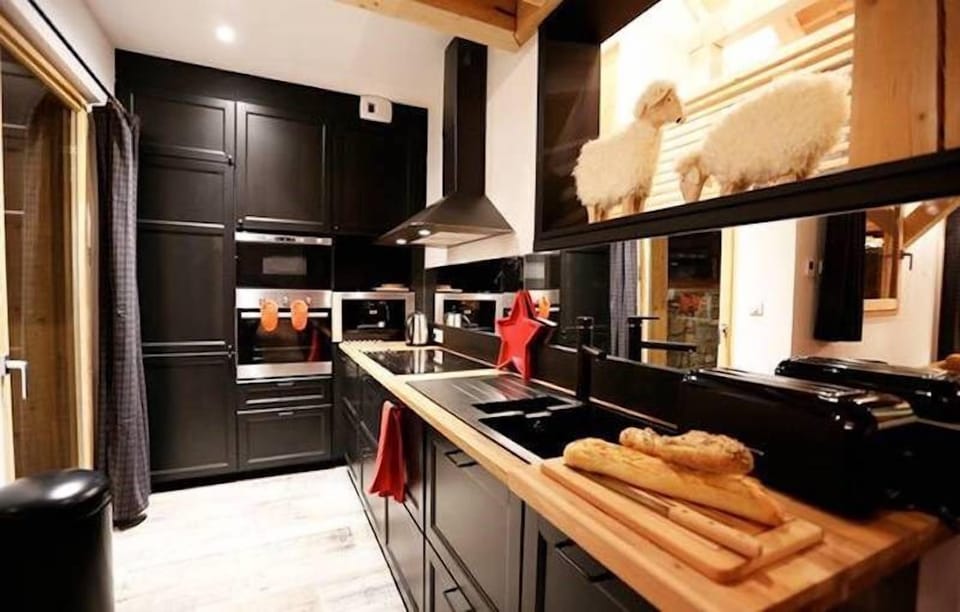 The fully-equipped kitchen features all the amenities you'd need to make a delicious meal.