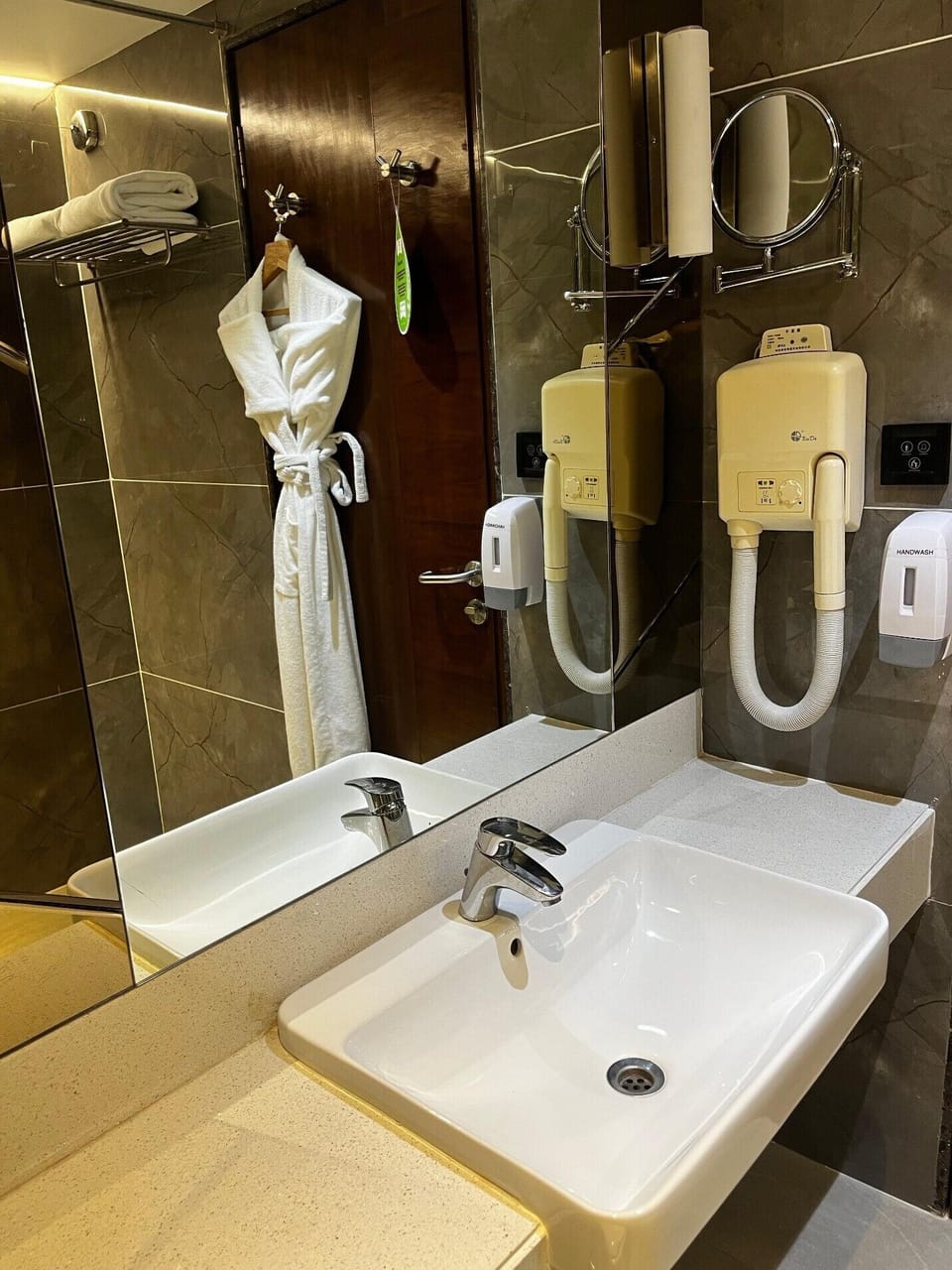 Executive Suite, 1 King Bed | Bathroom | Shower, free toiletries, hair dryer, slippers