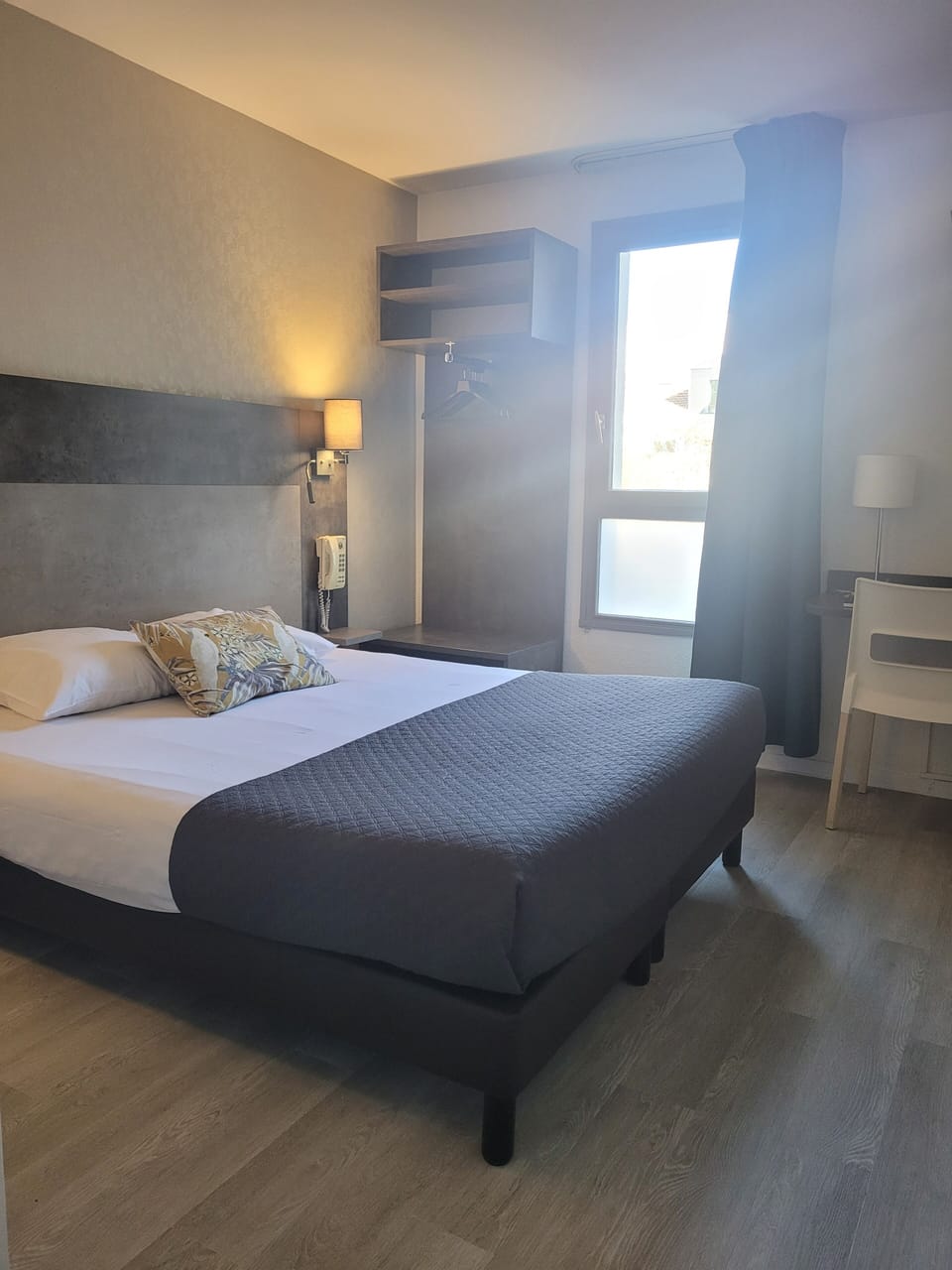 Privilege Room | Desk, blackout drapes, soundproofing, iron/ironing board