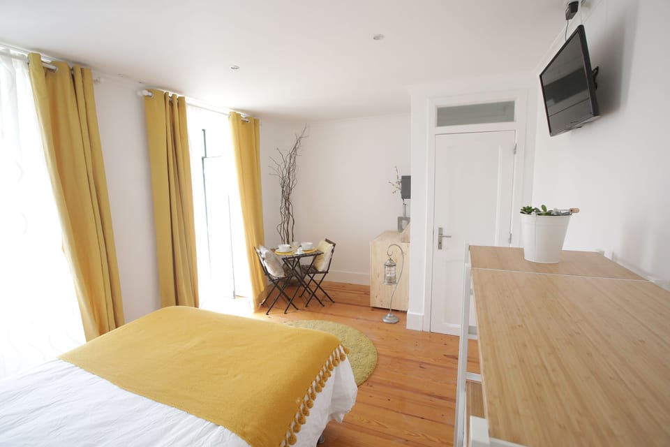 Triple Room, Balcony | Minibar, individually decorated, individually furnished, blackout drapes