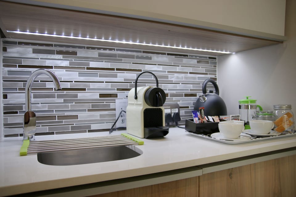 Executive Studio, 1 Bedroom, Kitchenette, Sea Facing | Private kitchenette | Coffee/tea maker, electric kettle