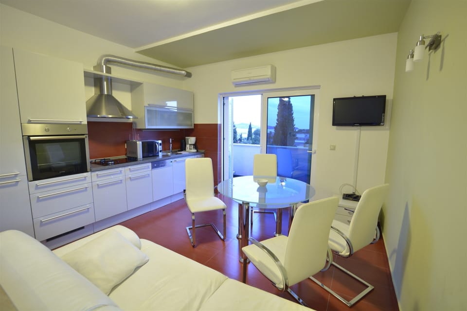 Premium Apartment, 2 Bedrooms, Balcony, Sea View | Living area | TV