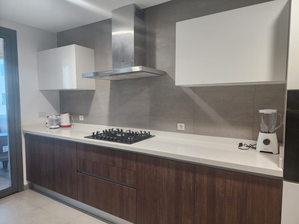 Presidential Apartment, Multiple Beds, Sea View | Private kitchen | Coffee/tea maker, full-size fridge, microwave, oven