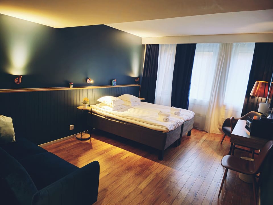 Blackout drapes, soundproofing, iron/ironing board, free WiFi