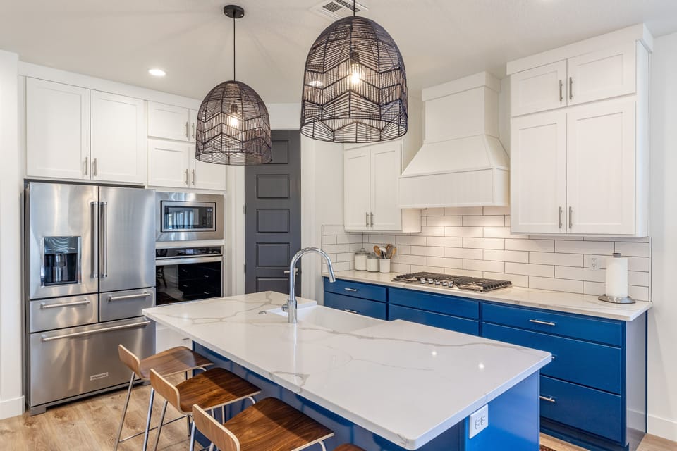 Kitchen - The Kitchen is complete with everything you will need for meal preparations including pots, pans, baking dishes, plates, cups, silverware, cutlery, and an assortment of cooking utensils.