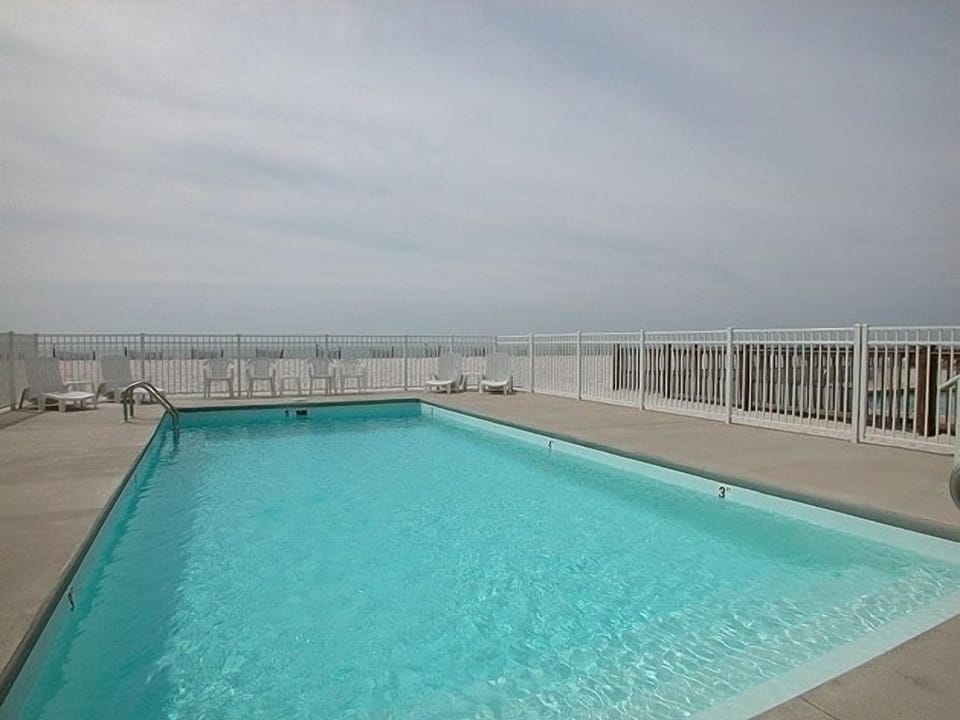 Enjoy a freshing dip in a spacious 32'X16' swimming pool.