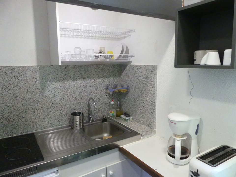 Mini-fridge, microwave, stovetop, toaster