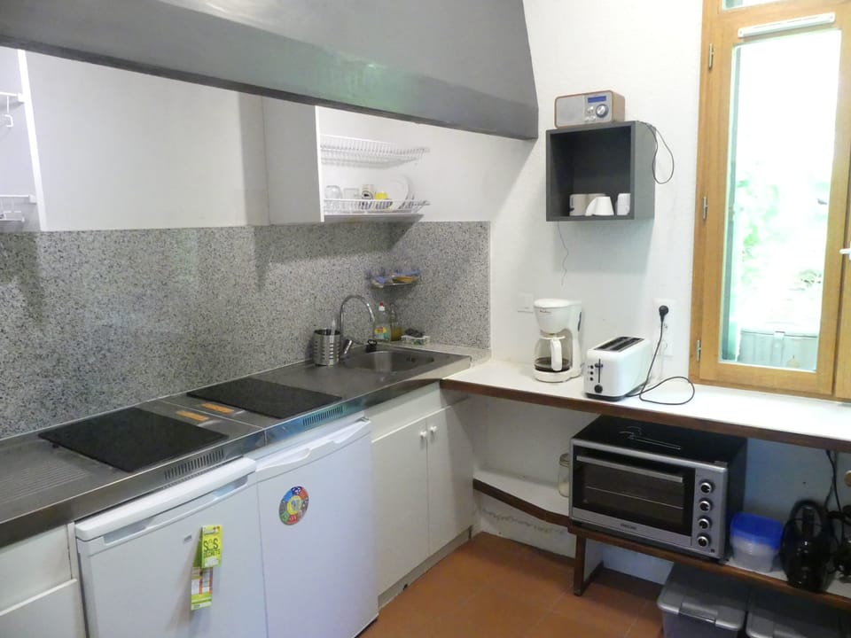 Mini-fridge, microwave, stovetop, toaster
