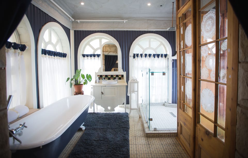 Room (The Dany) | Bathroom | Designer toiletries, hair dryer, bathrobes, slippers