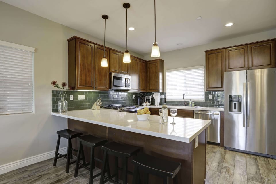 Dining for six plus 4 bar stools.