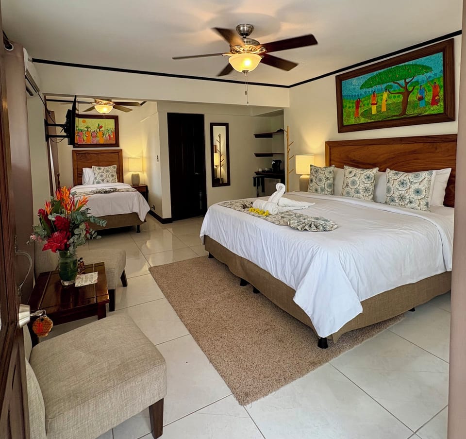 Premium Triple Room | Pillowtop beds, in-room safe, iron/ironing board, free WiFi