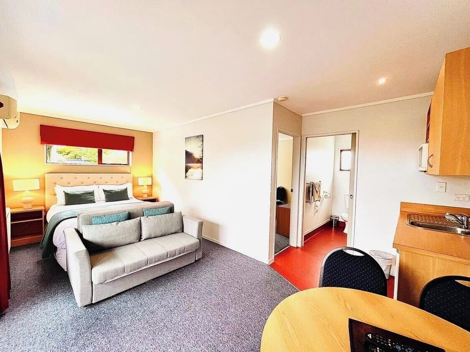 Family Suite, 1 Bedroom, Garden View | In-room safe, iron/ironing board, free WiFi, bed sheets