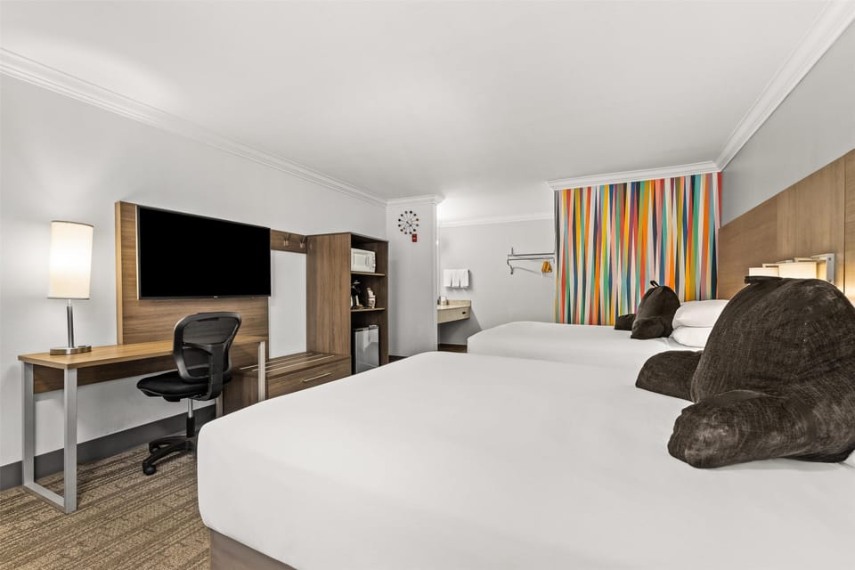 Room, 2 Queen Beds, Non Smoking | Desk, laptop workspace, blackout drapes, iron/ironing board