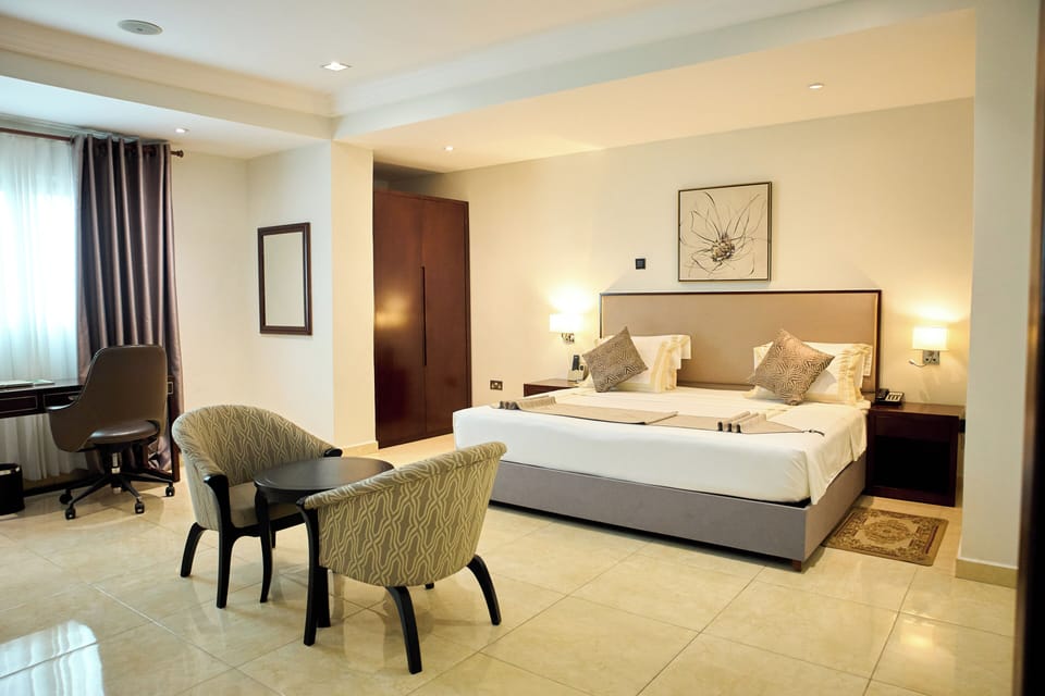 Executive Double Room | Down comforters, in-room safe, desk, laptop workspace