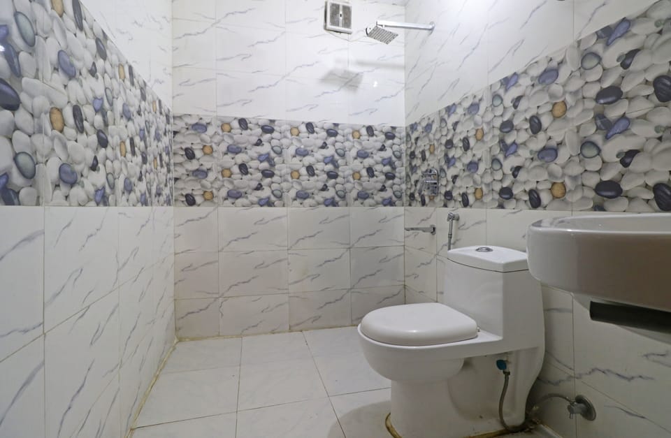 Shower, rainfall showerhead, designer toiletries, hair dryer