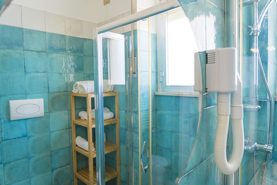 Family Quadruple Room, Sea View | Bathroom | Free toiletries, hair dryer, towels