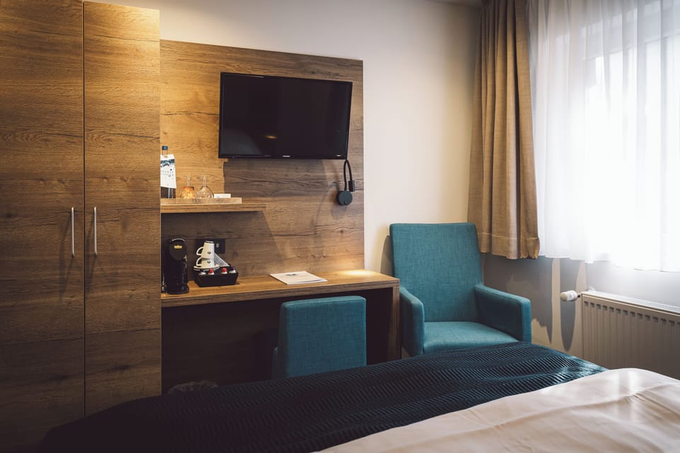 Classic Double Room | Living area | Flat-screen TV