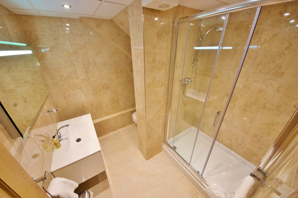 Family Room for 4 | Bathroom | Hair dryer, towels