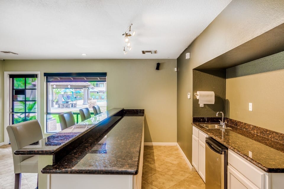 Community club house overlooks salt water heated pool/ hot tub, 