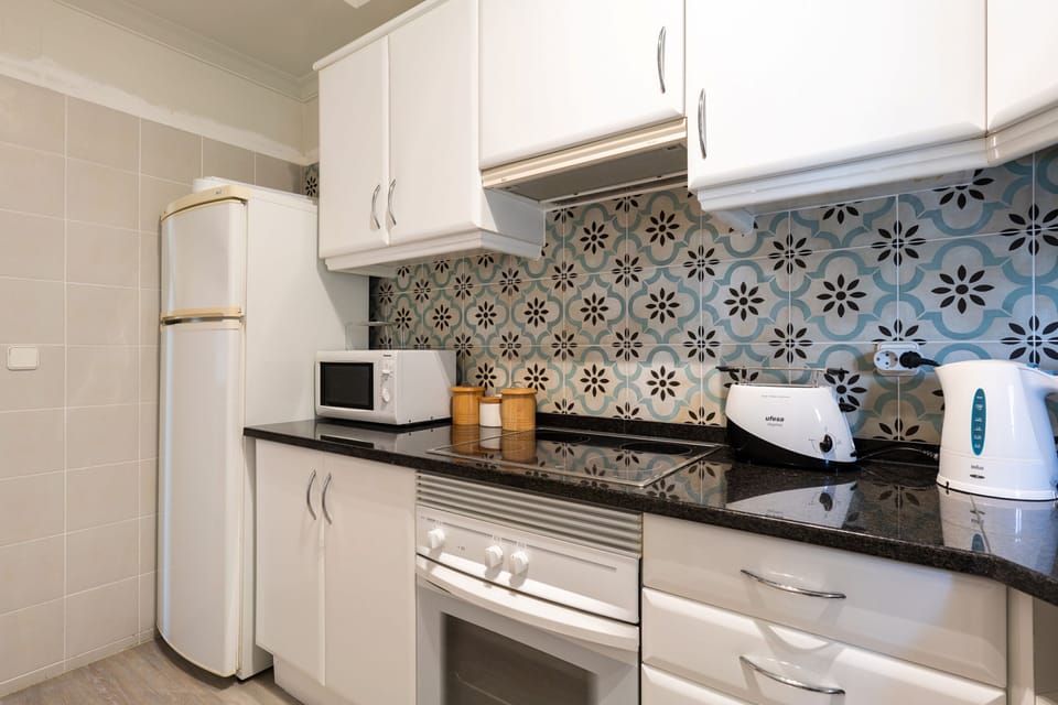 Apartment, 2 Bedrooms, Balcony, Sea View | Private kitchen | Full-size fridge, microwave, oven, stovetop