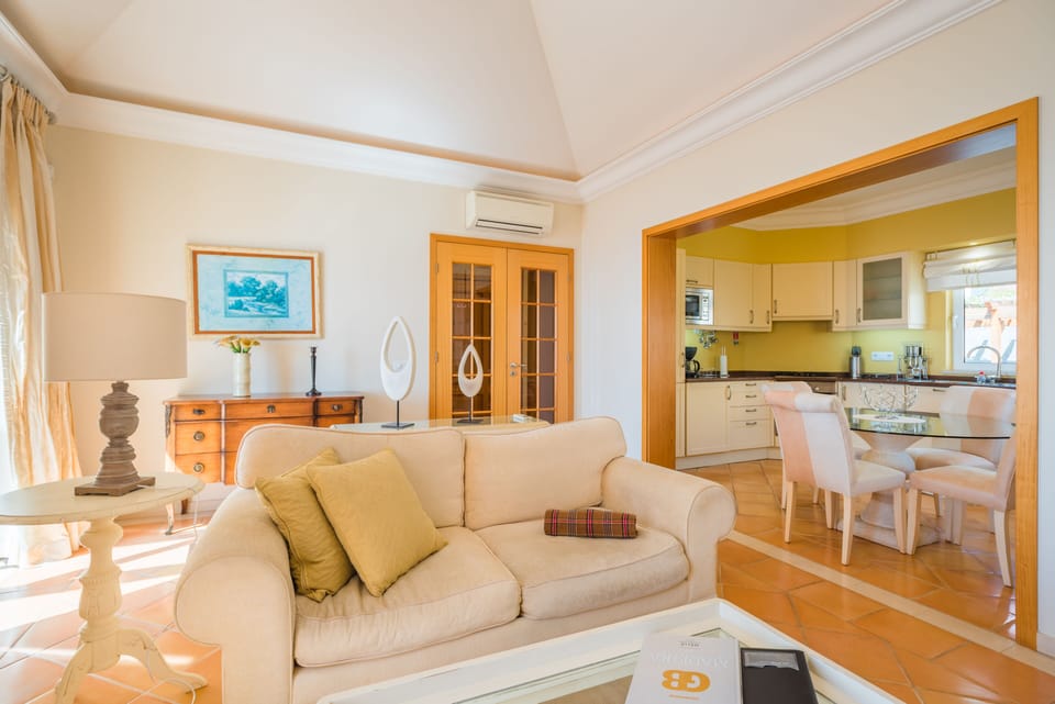 Apartment, 1 Bedroom, Balcony, Sea View | Living area | Flat-screen TV, fireplace, heated floors