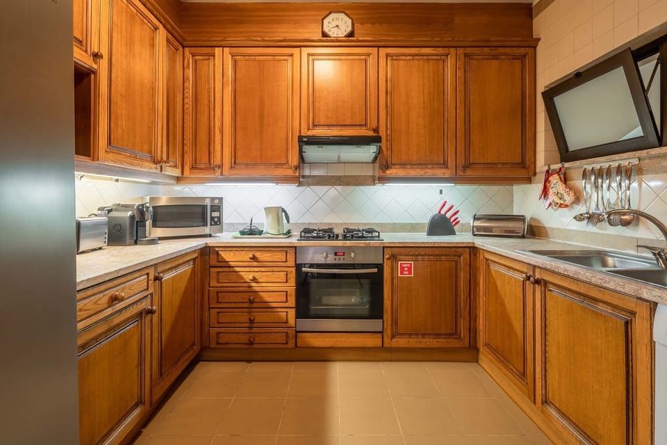 Apartment, 2 Bedrooms, Balcony | Private kitchen | Full-size fridge, microwave, oven, stovetop