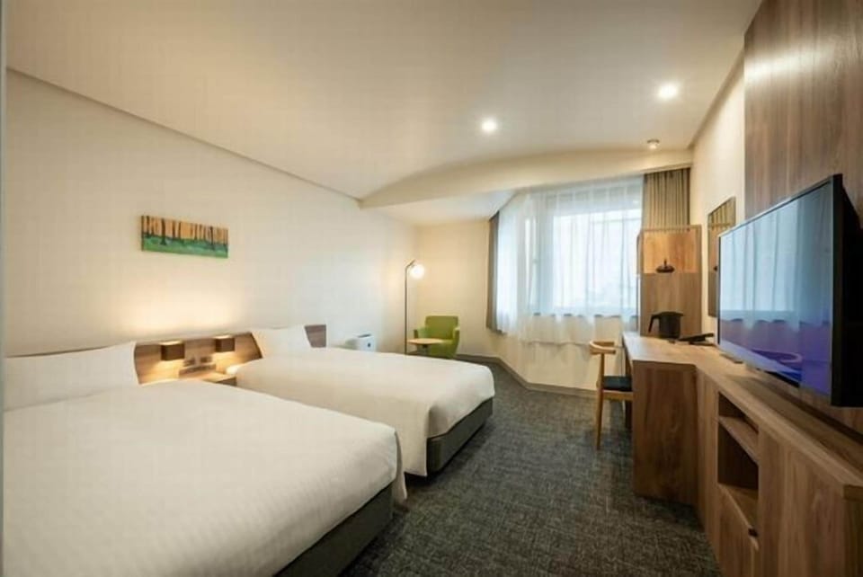 Basic Twin Room, Multiple Beds | Laptop workspace, iron/ironing board, free WiFi, bed sheets