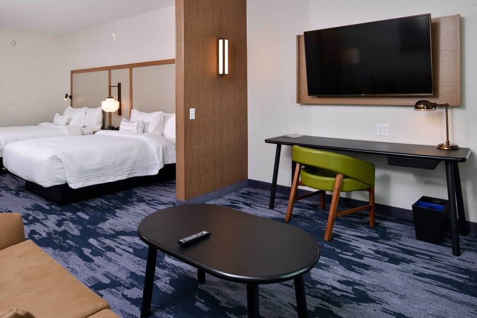 Suite, 2 Queen Beds | Bathroom | Shower, free toiletries, hair dryer, towels