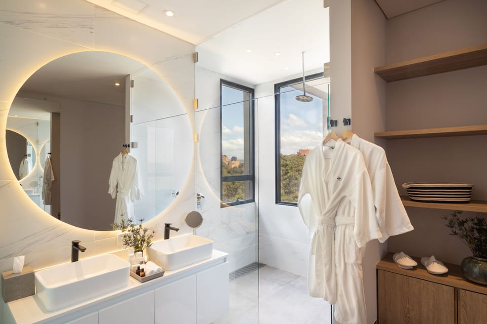 Grand Penthouse | Bathroom | Shower, rainfall showerhead, designer toiletries, hair dryer