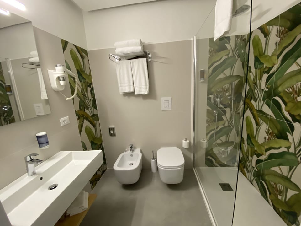 Separate tub and shower, deep soaking tub, rainfall showerhead