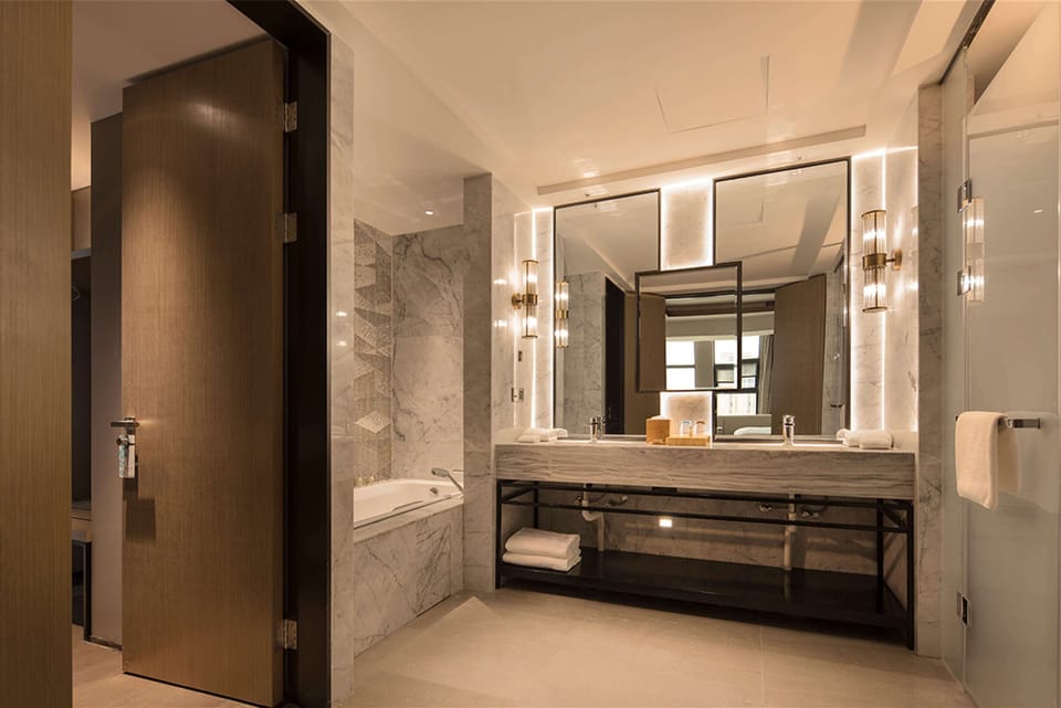 Suite, 1 Bedroom | Bathroom | Shower, free toiletries, hair dryer, slippers