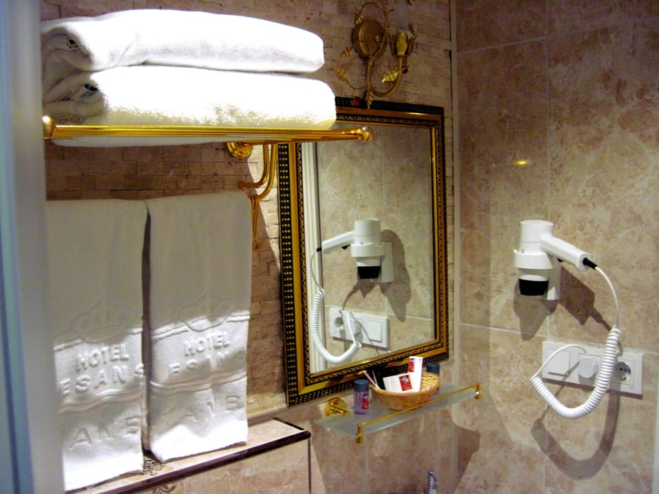 Shower, free toiletries, hair dryer, slippers