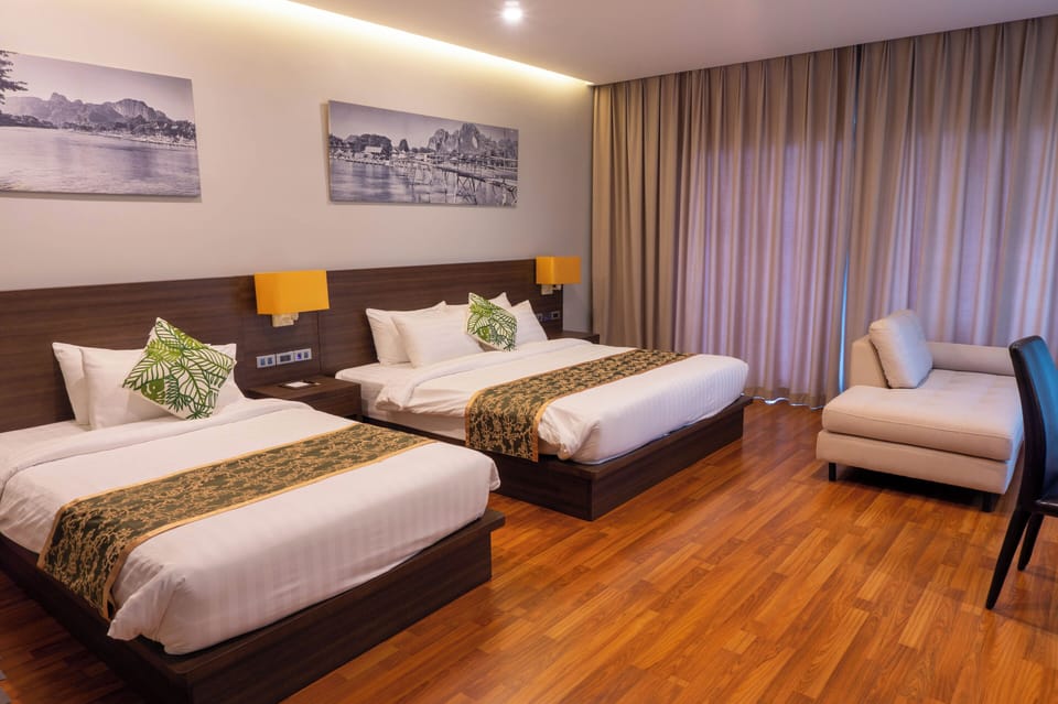 Family Triple Room | Minibar, in-room safe, individually furnished, desk