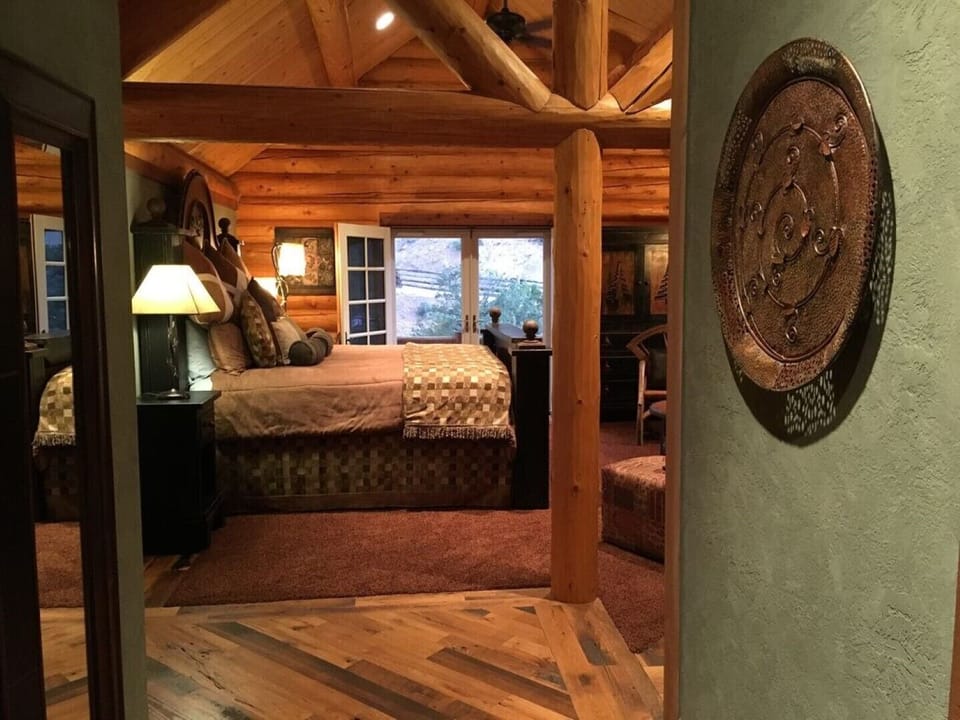 The spacious master bedroom includes a private balcony.