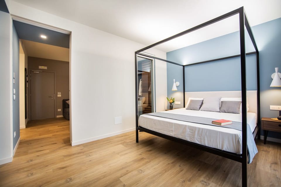 Suite, Balcony, Lake View | Minibar, in-room safe, desk, free WiFi