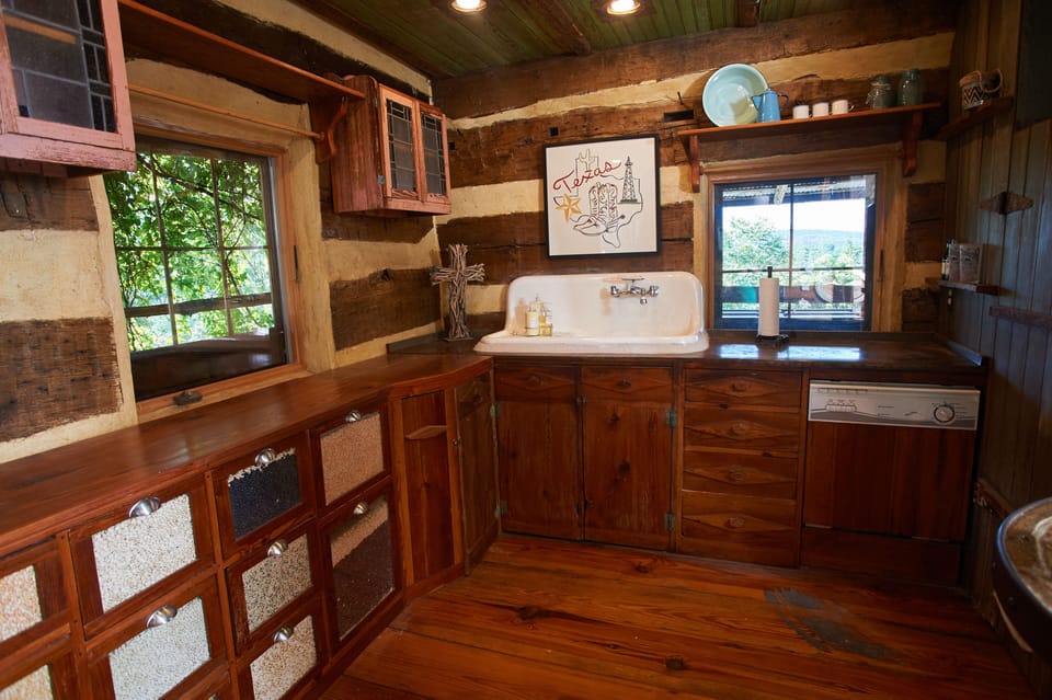 Take a gander at this antique sink - perfect for this historic kitchen. 
