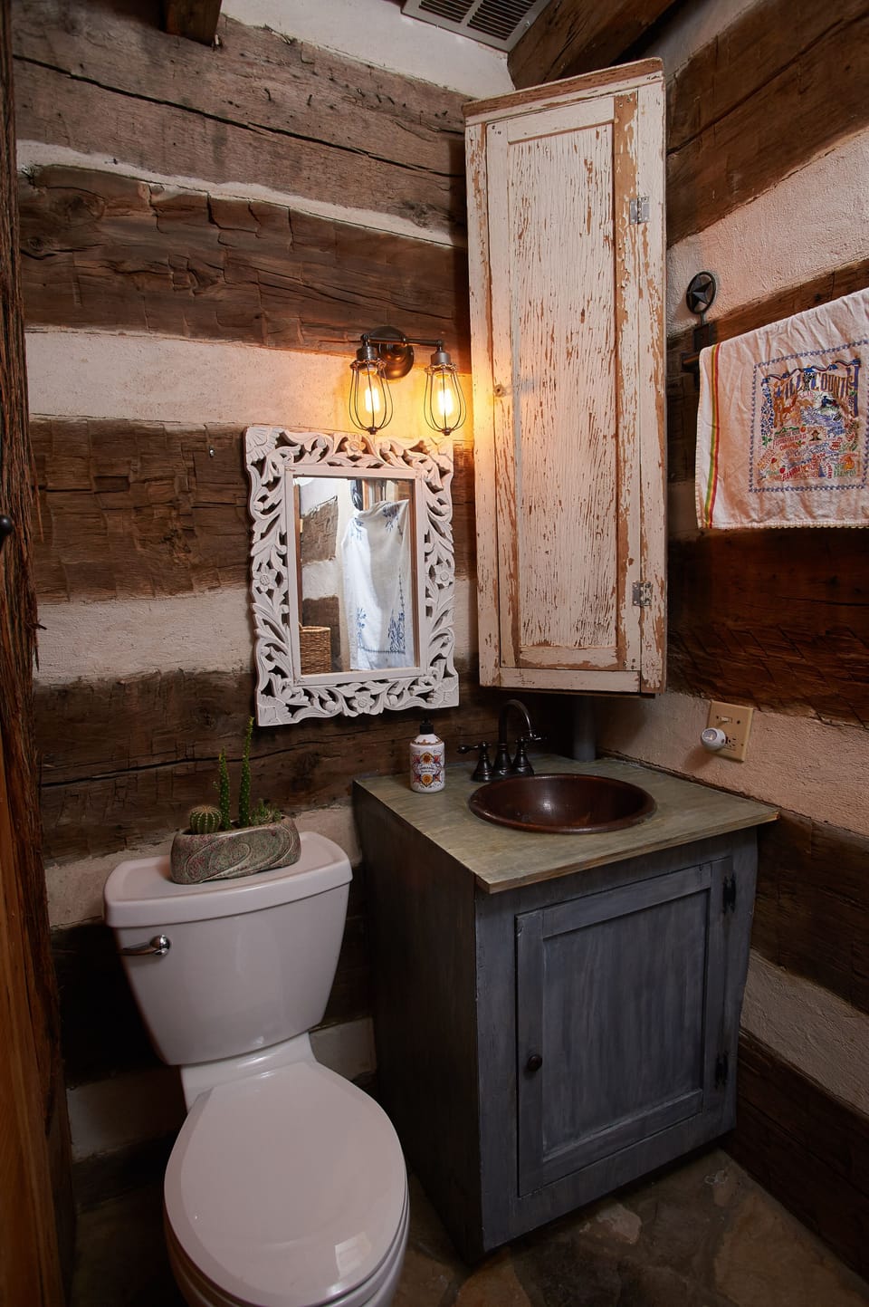 1/2 Bathroom, directly off of living area - and contains washing machine & dryer