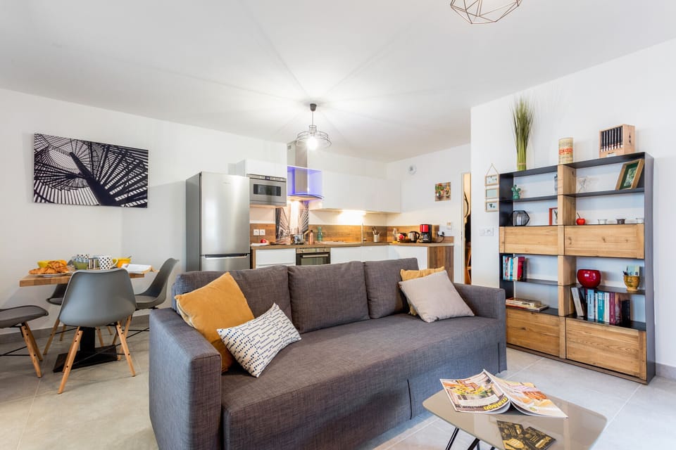 Bright living room with a double sofa bed