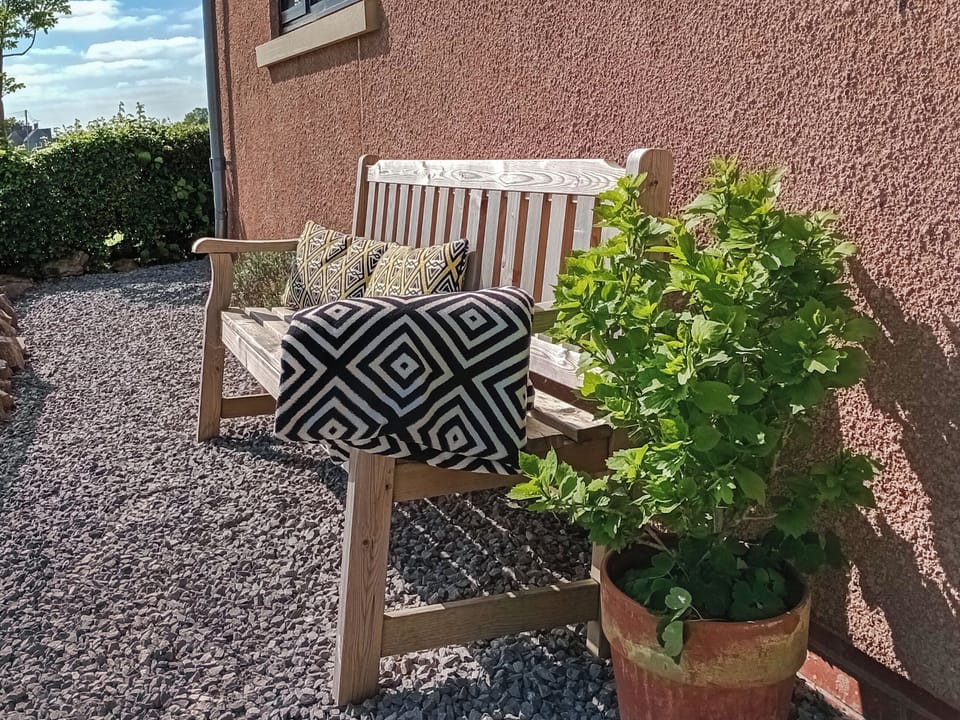 Bench at the rear of the Sett, with views of Cheddar gorge | The Sett, Stone Allerton, near Cheddar
