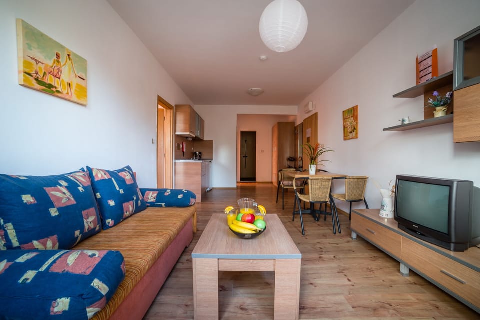 Comfort Apartment, 2 Bedrooms, Balcony | Living area | 20-inch TV with cable channels