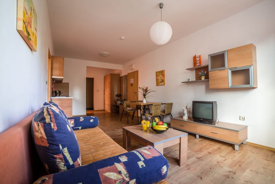 Comfort Apartment, 2 Bedrooms, Balcony | Living area | 20-inch TV with cable channels