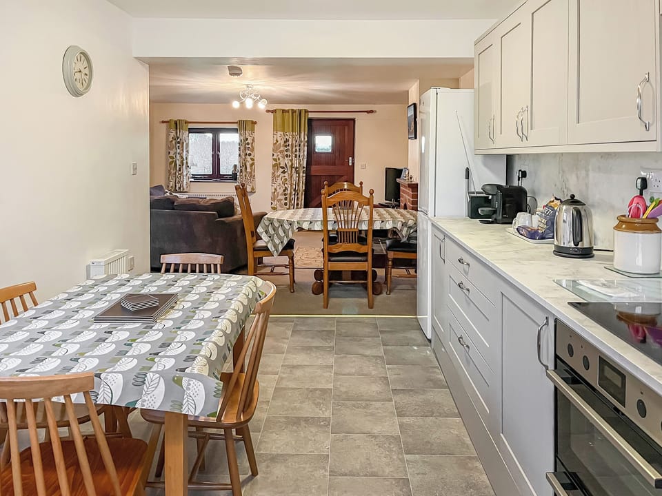 Kitchen/diner | Trewin Court - Well Farm Holiday Cottages, Holsworthy, near Launceston